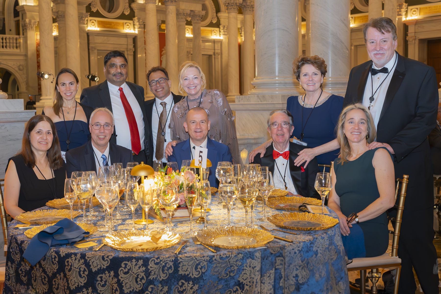 Guests seated together at a formal dinner